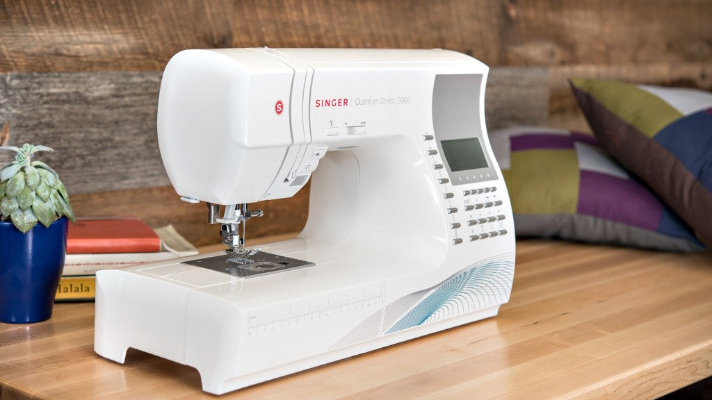 Singer Quantum Stylist 9960 Sewing Machine with Auto thread cutter - includes extension table and hard cover